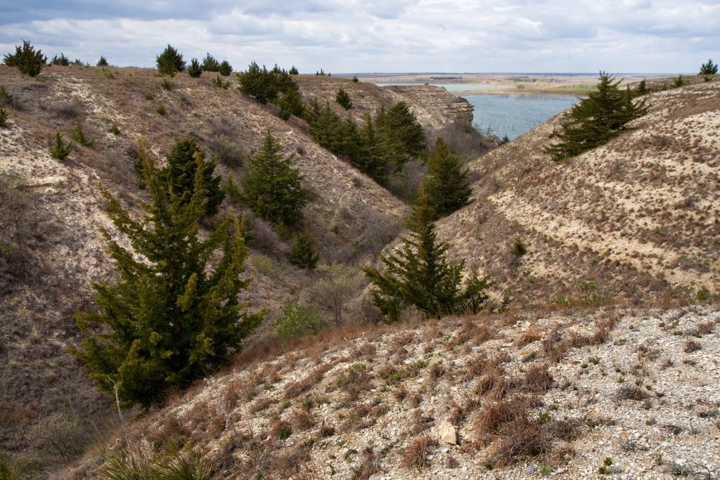 Cedar Bluff Reservoir seen from the south shore, with limestone bluffs